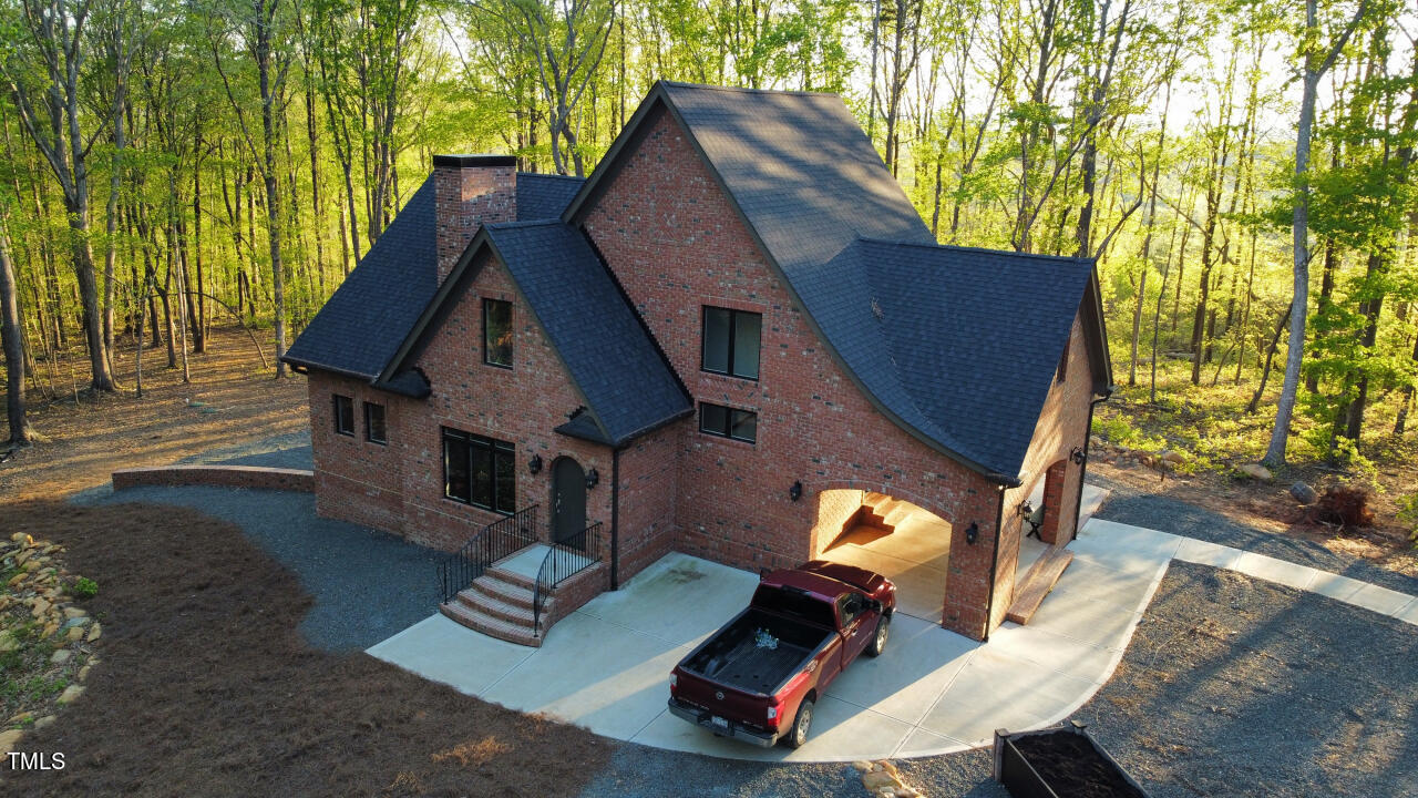 804 Crabtree Glenn Road Rougemont, NC 27572 - Photo 7 of 66 a aerial view of a house with swimming pool next to a yard