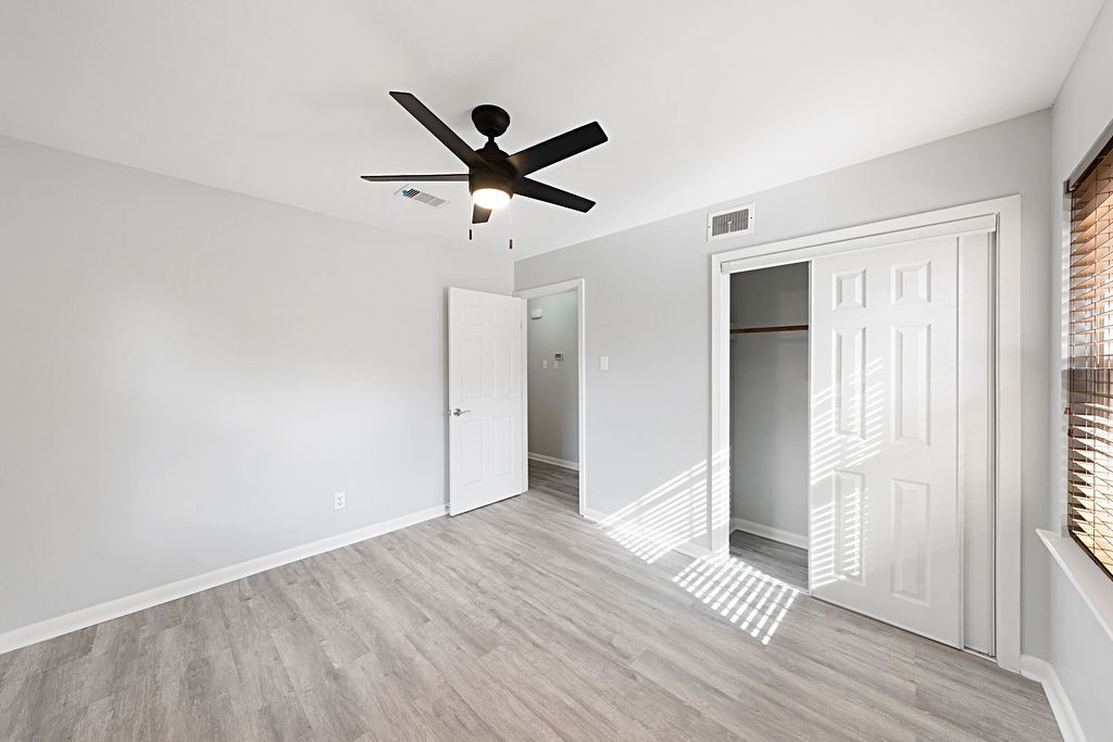 614 Gilpin Street Houston, TX 77034 - Photo 15 of 27 The second bedroom boasts updated vinyl plank floors, fresh paint and a nice size closet.