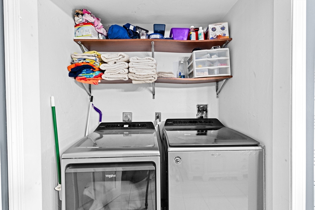 40 Cohasset Road Wareham, MA 02532 - Photo 15 of 42 a utility room with sink and wooden floor