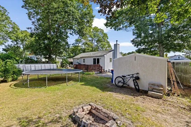 a house view with a backyard space