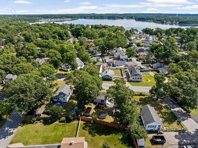 a view of a city with green field