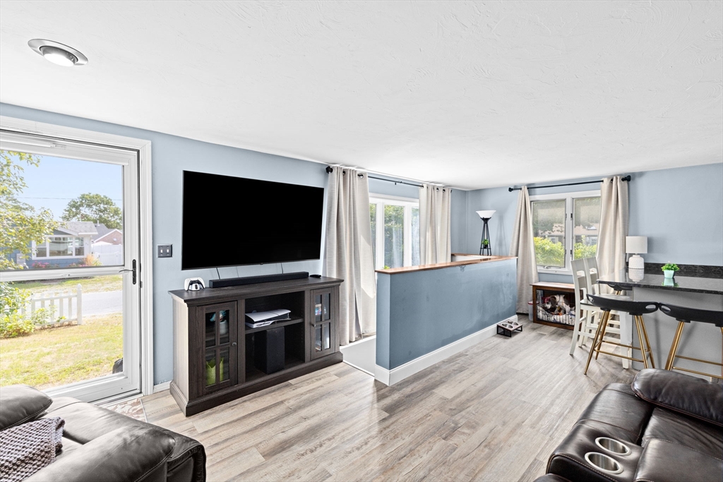 40 Cohasset Road Wareham, MA 02532 - Photo 7 of 42 a living room with furniture and a flat screen tv