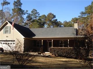 1744 Campbell Road Covington, GA 30014 - Photo 1 of 25 a front view of a house with a yard
