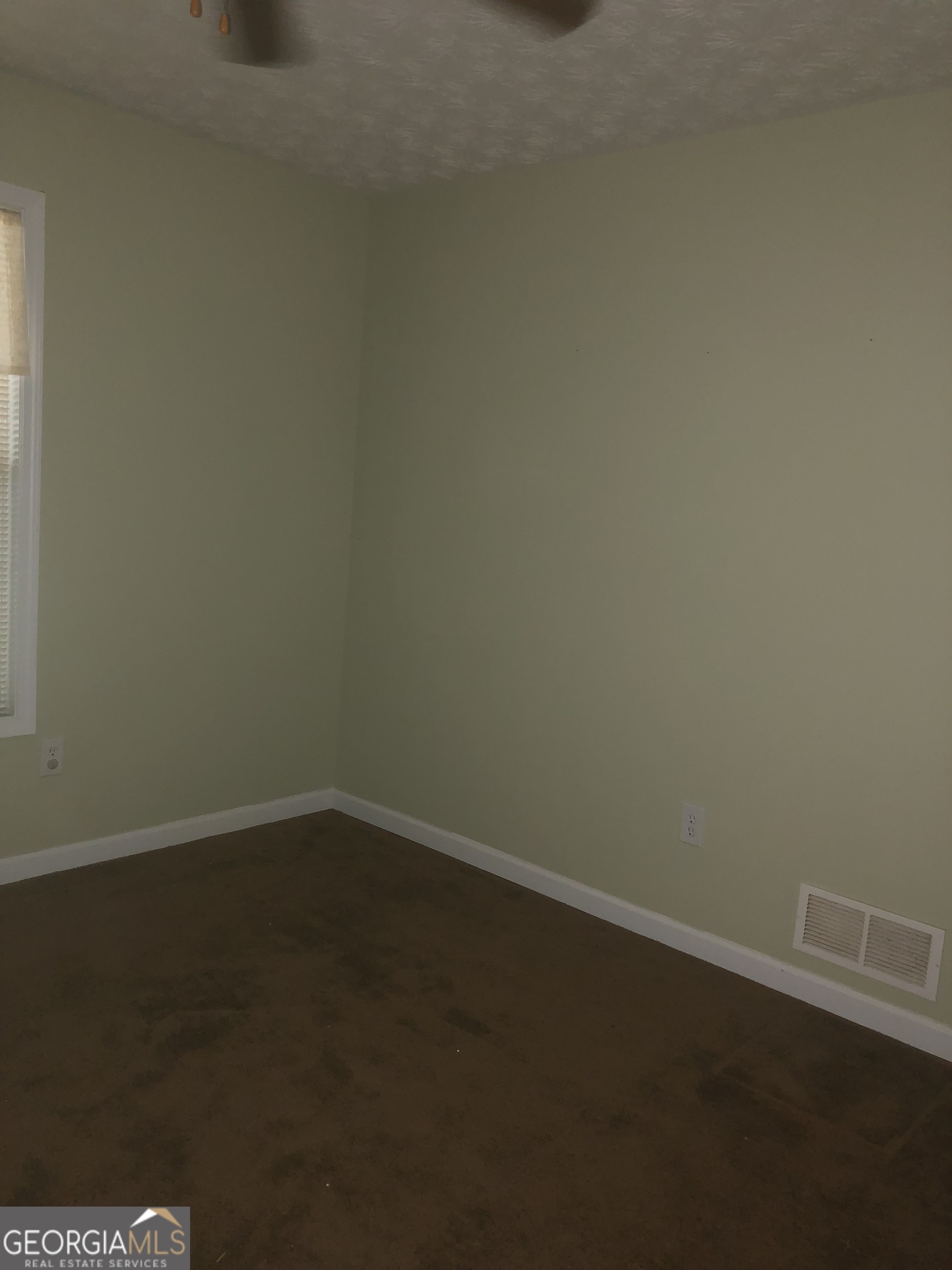 1744 Campbell Road Covington, GA 30014 - Photo 14 of 25 a view of an empty room