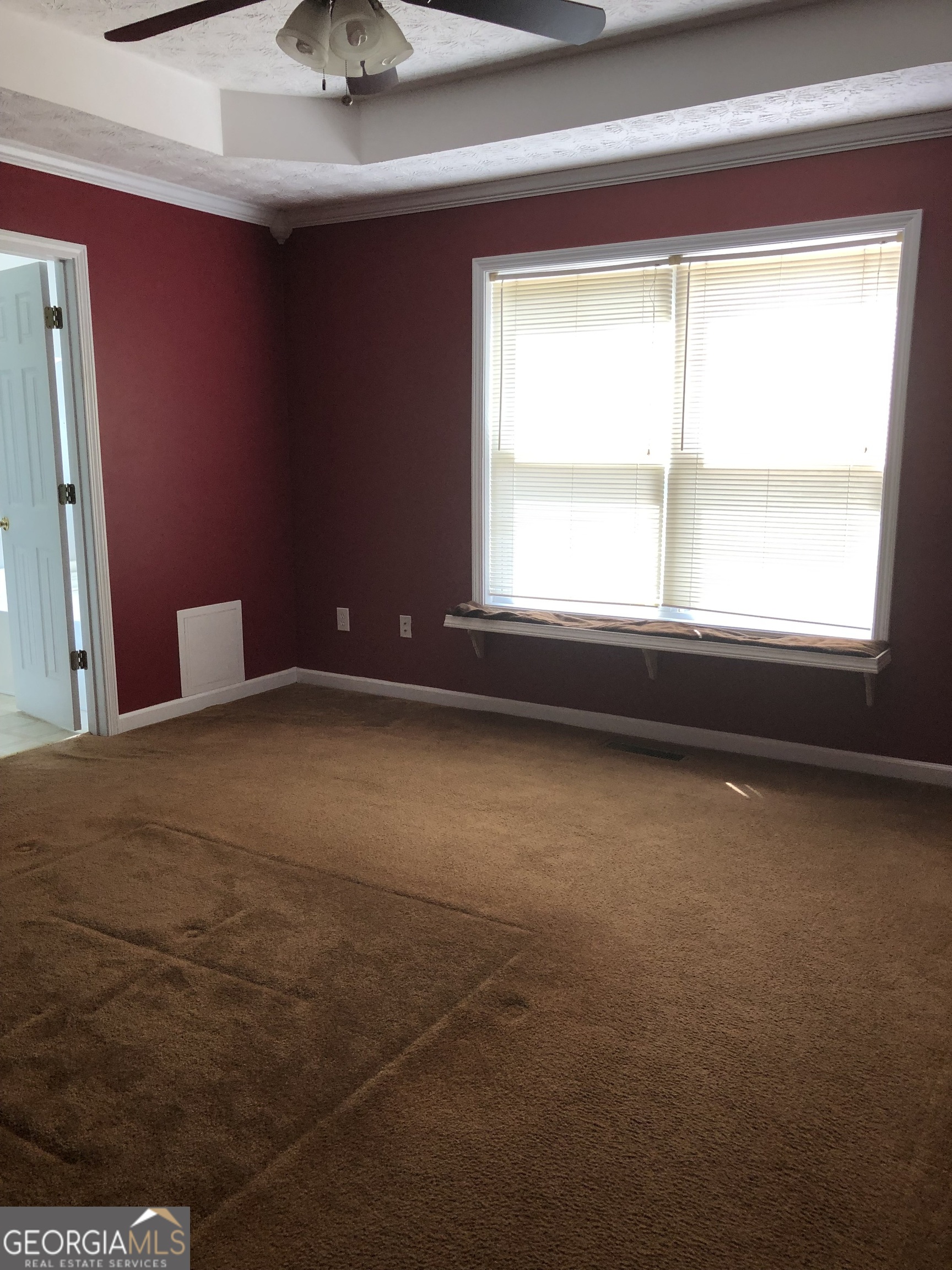 1744 Campbell Road Covington, GA 30014 - Photo 16 of 25 a view of an empty room with a window