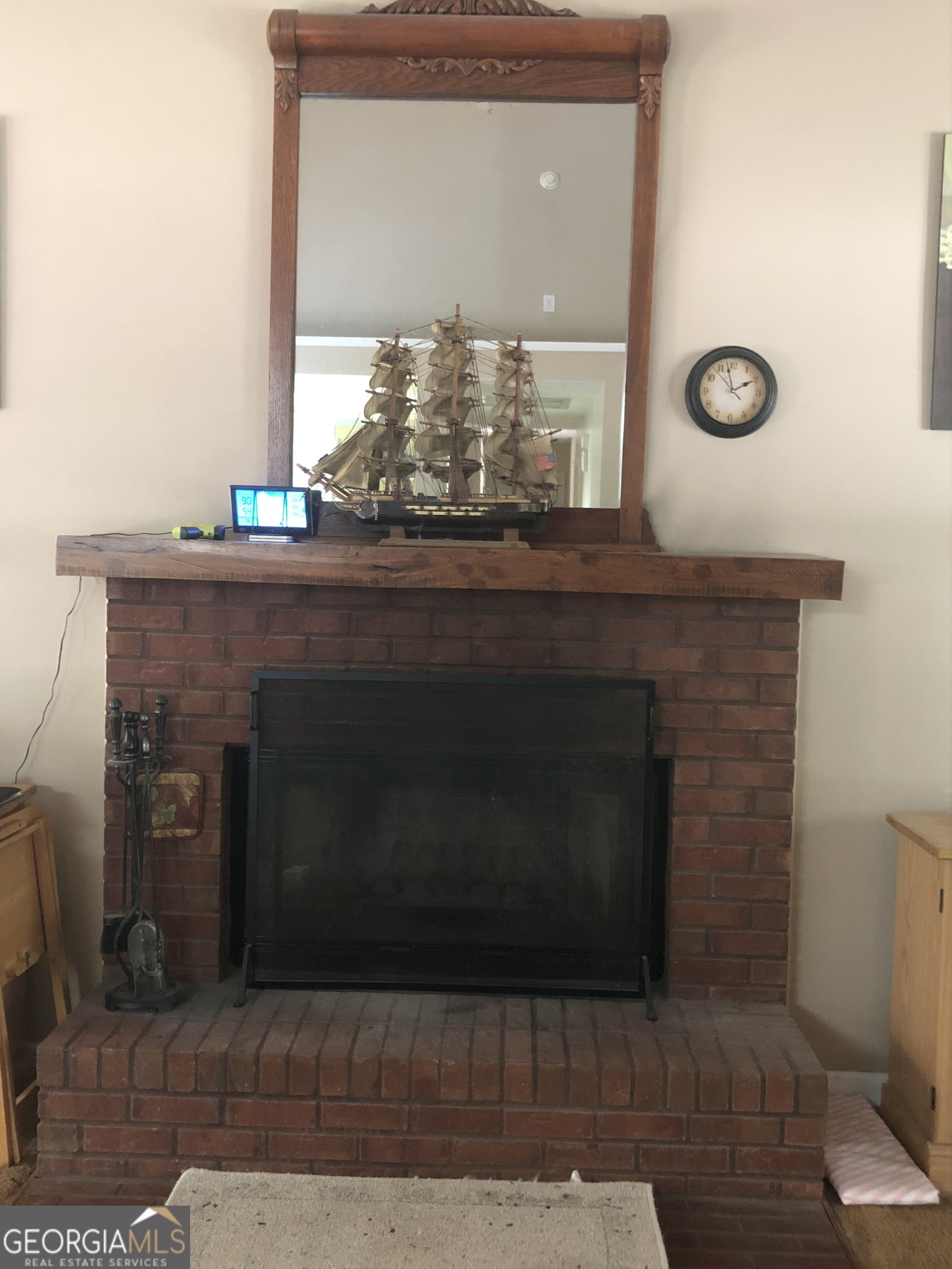 1744 Campbell Road Covington, GA 30014 - Photo 4 of 25 a living room with furniture and a fireplace
