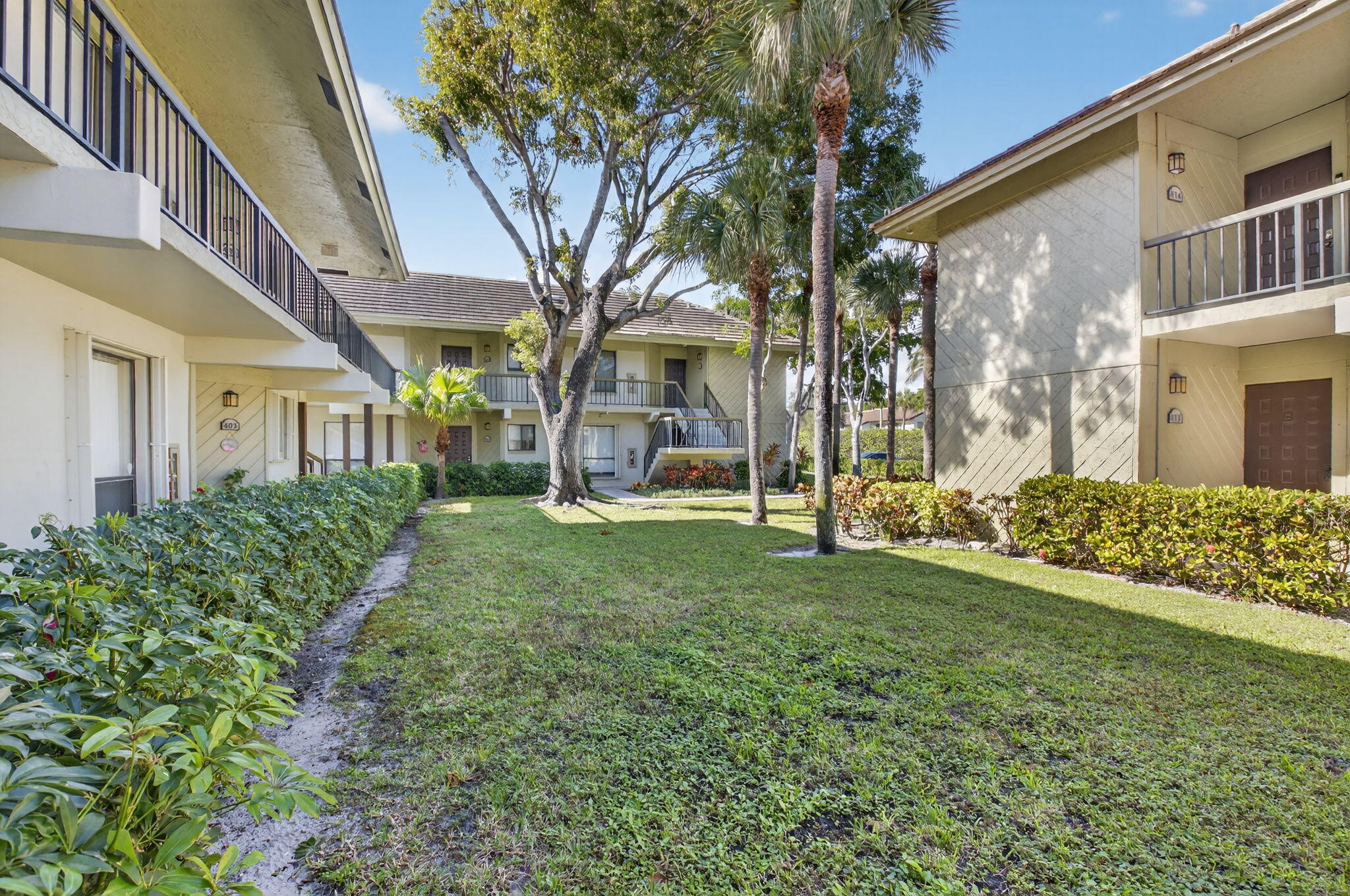 159 Northwest 70th Street, Unit 403 Boca Raton, FL 33487 - Photo 27 of 31 Green surroundings