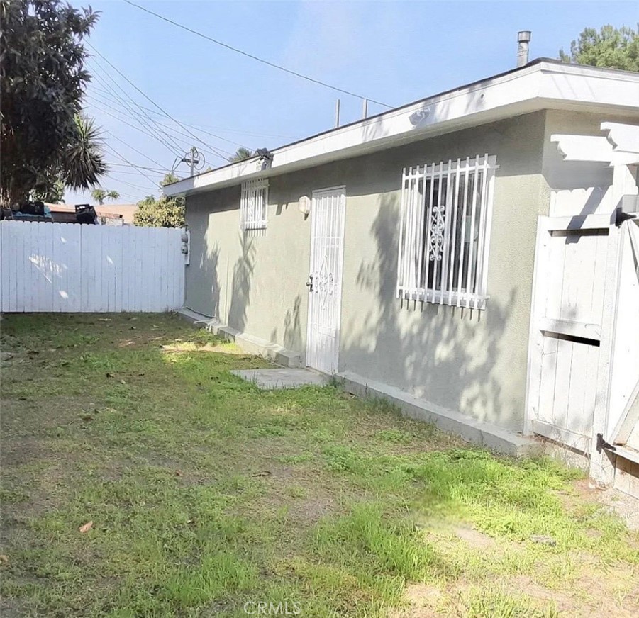 352 West Peach Street Compton, CA 90222 - Photo 9 of 9 a view of a house with a yard