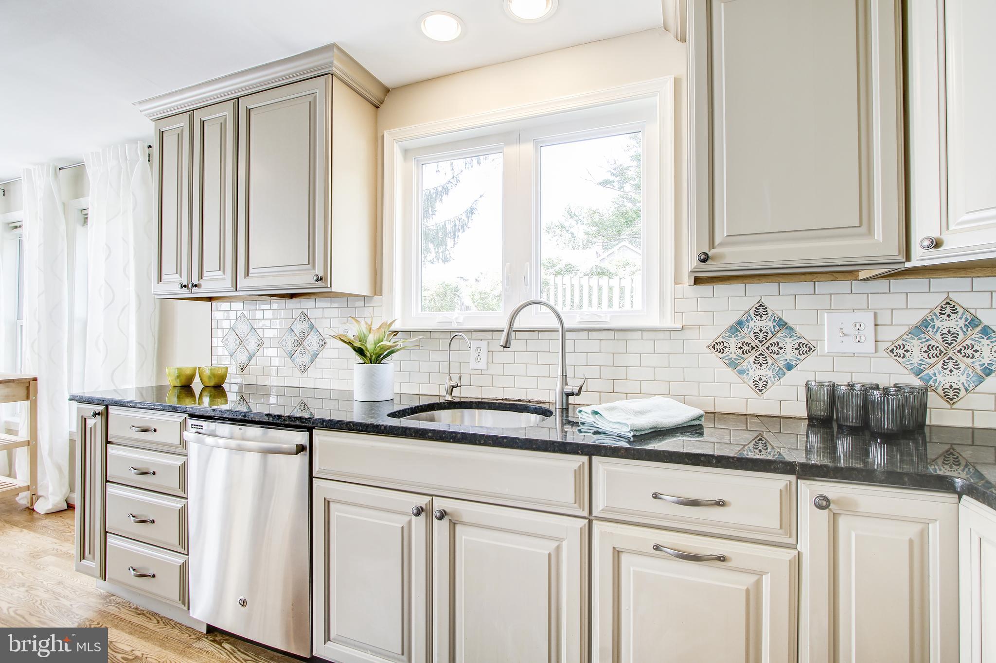 9909 Cherry Tree Lane Silver Spring, MD 20901 - Photo 14 of 45 Beautiful Cabinetry and Subway Tile