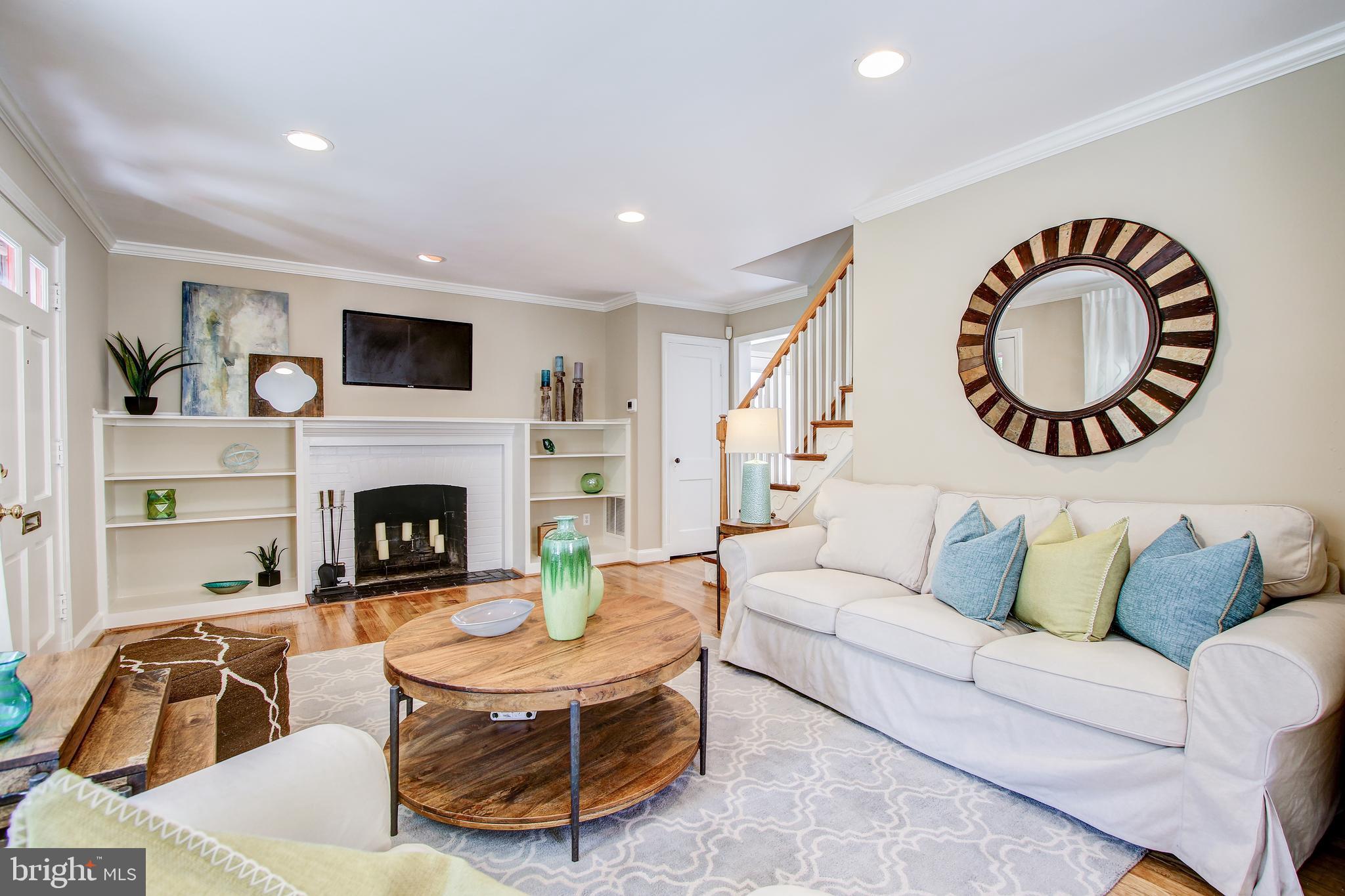 9909 Cherry Tree Lane Silver Spring, MD 20901 - Photo 7 of 45 Charming Living Room with Fireplace and Mantel