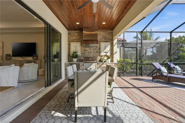 a view of a living room and a balcony