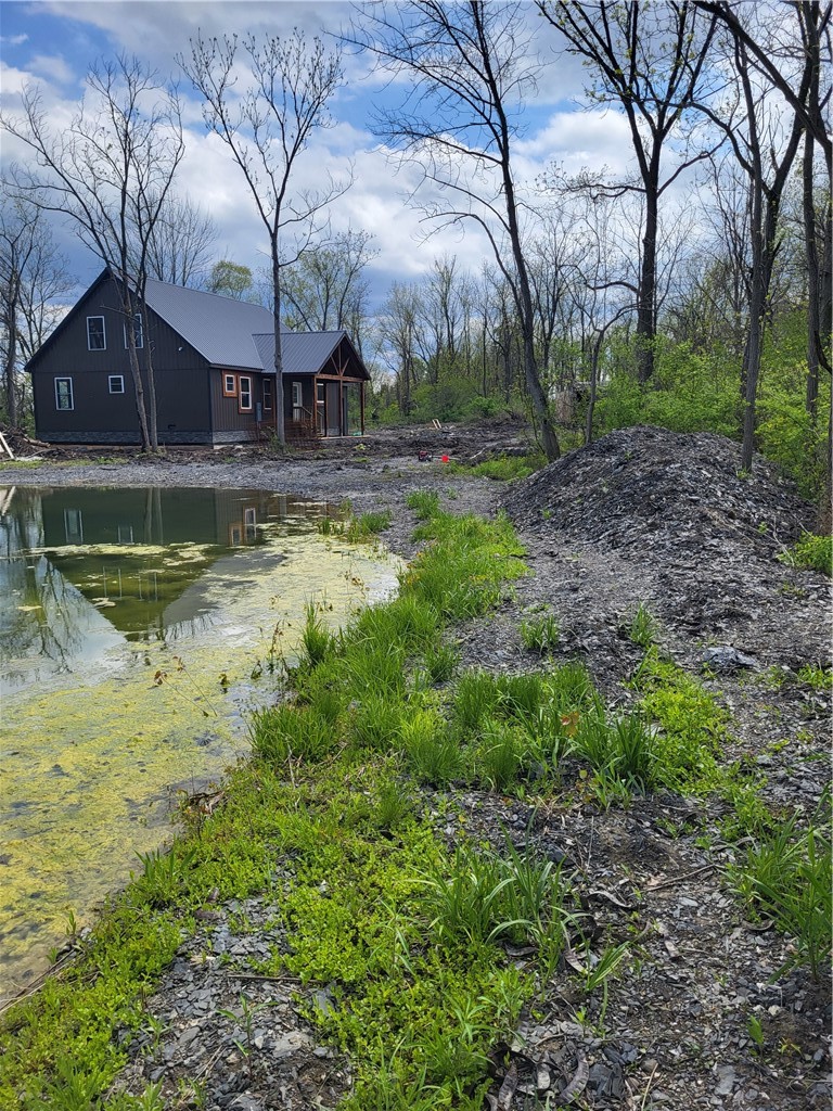 2855 Stout Road Manhattan, NY 10018 - Photo 2 of 17 pond view
