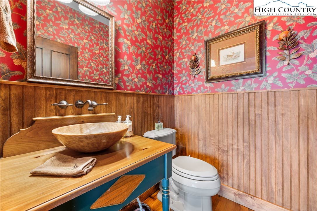 333 Windy Ridge Road Vilas, NC 28692 - Photo 22 of 46 a bathroom with a sink and a mirror