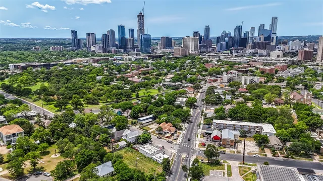 a view of a city with tall buildings
