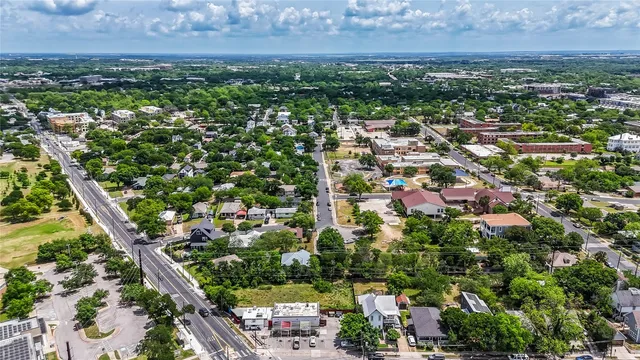a view of outdoor space with signage and flags