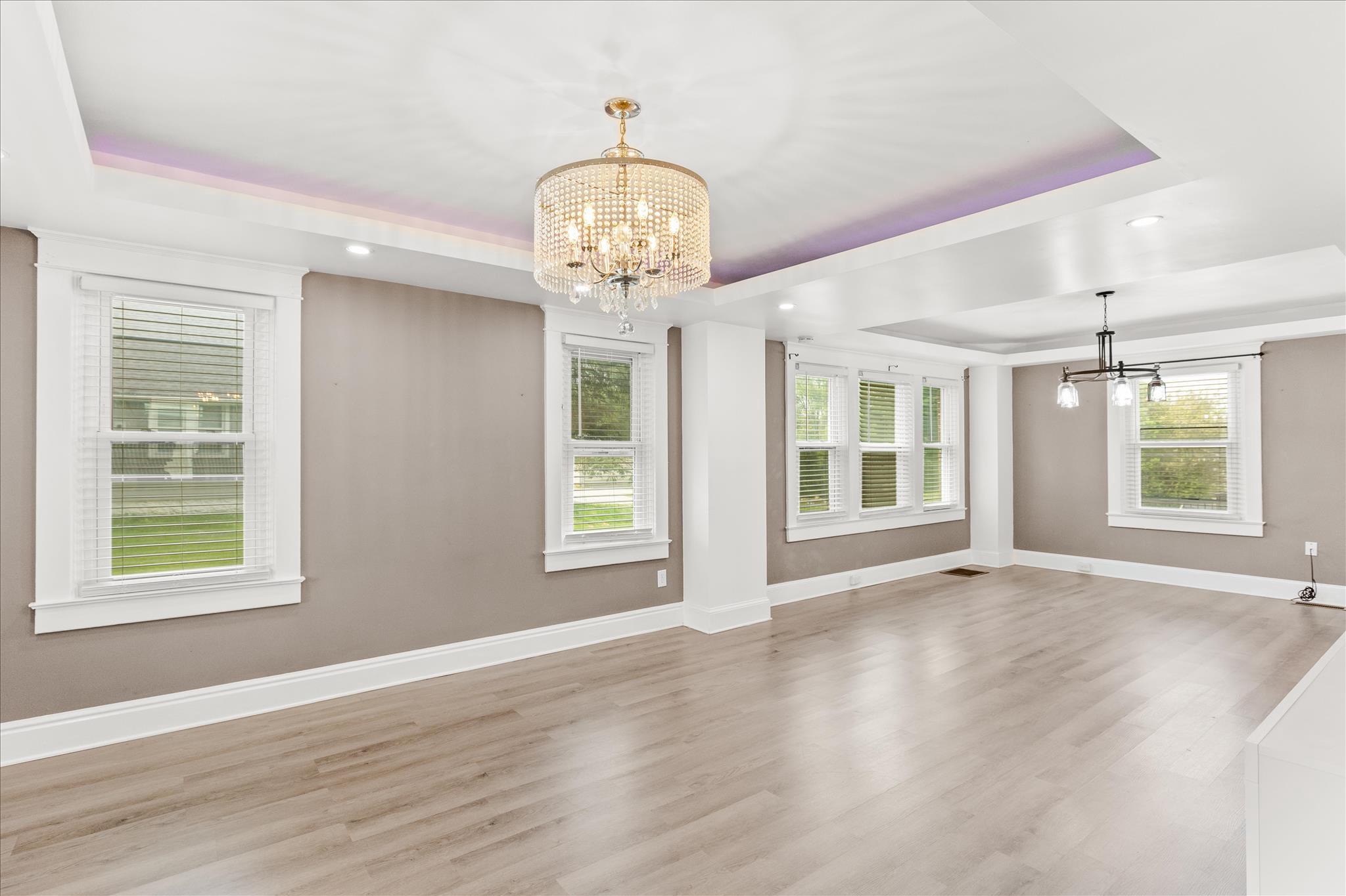310 Hanover Road York, PA 17408 - Photo 10 of 56 a view of an empty room with wooden floor and a window