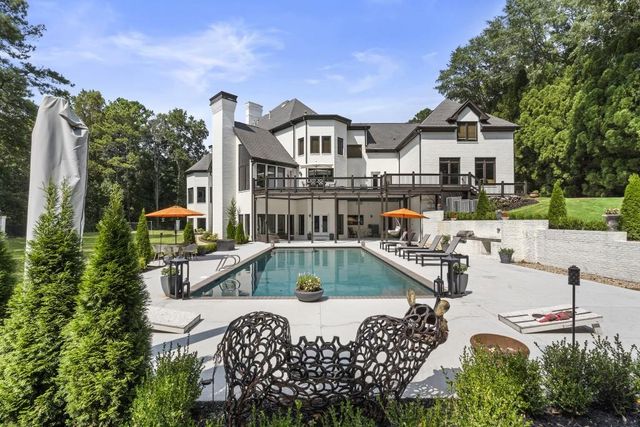 a view of a chairs and tables in the patio