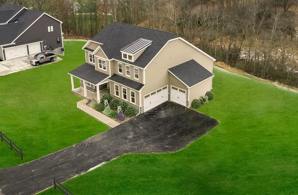 5128 Cline Hollow Road Murrysville, PA 15632 - Photo 1 of 14 an aerial view of a house