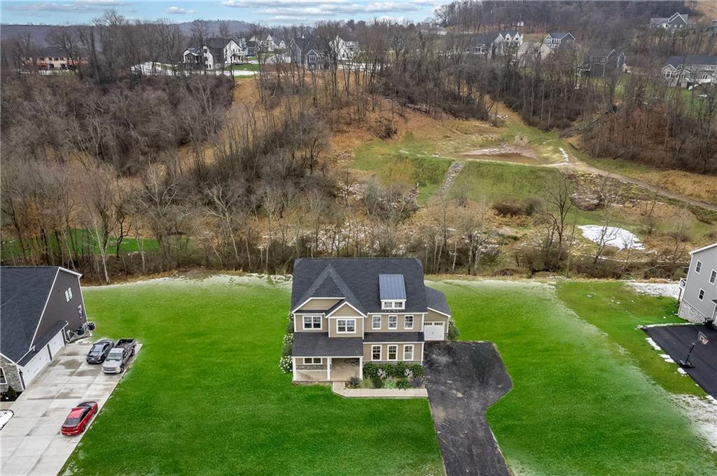 5128 Cline Hollow Road Murrysville, PA 15632 - Photo 3 of 14 a view of a garden with houses