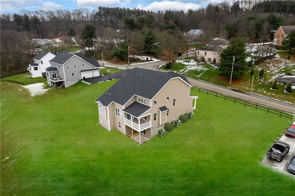 5128 Cline Hollow Road Murrysville, PA 15632 - Photo 5 of 14 a view of a house with a yard and sitting area