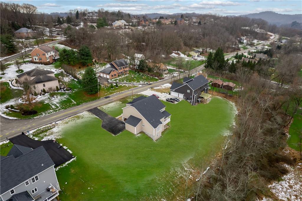 5128 Cline Hollow Road Murrysville, PA 15632 - Photo 6 of 14 an aerial view of residential houses with outdoor space and river