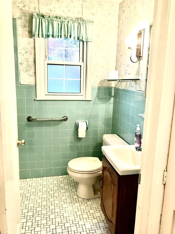66 Burnside Terrace Springfield, MA 01118 - Photo 14 of 29 a bathroom with a sink toilet and shower
