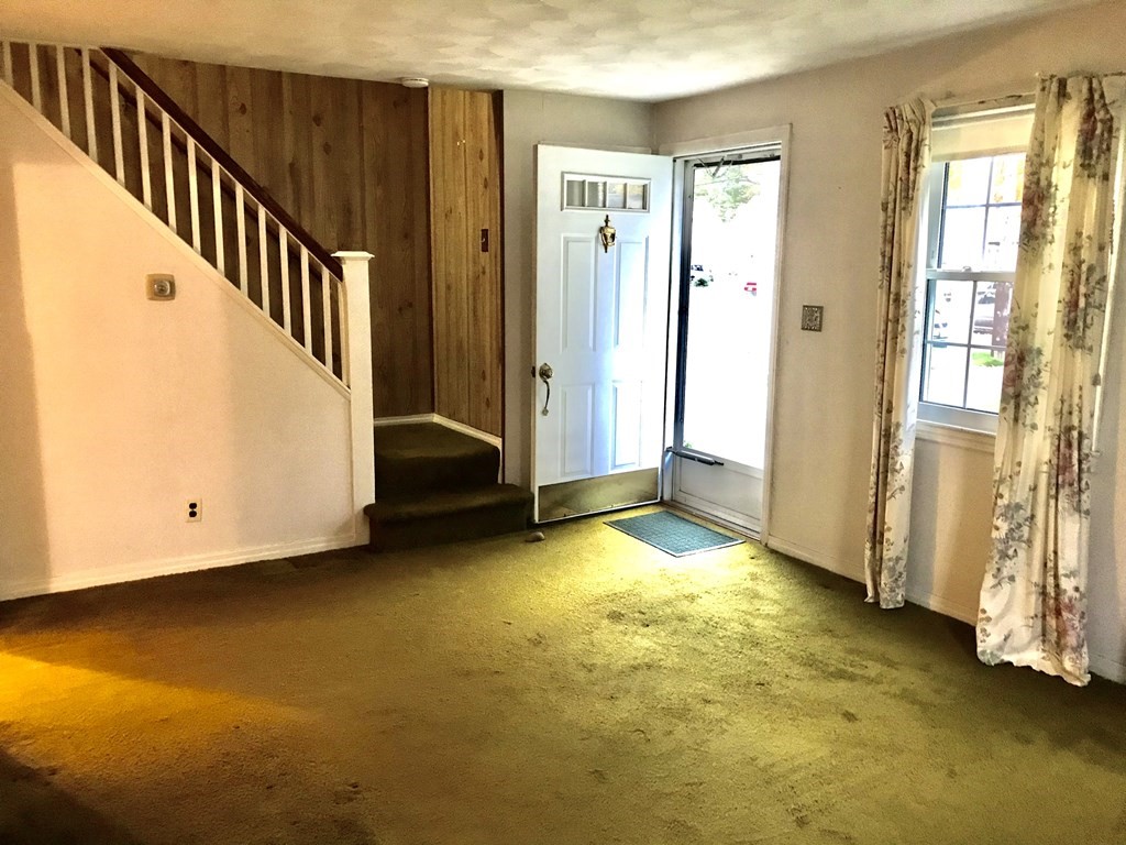 66 Burnside Terrace Springfield, MA 01118 - Photo 17 of 29 a view of an empty room with stairs