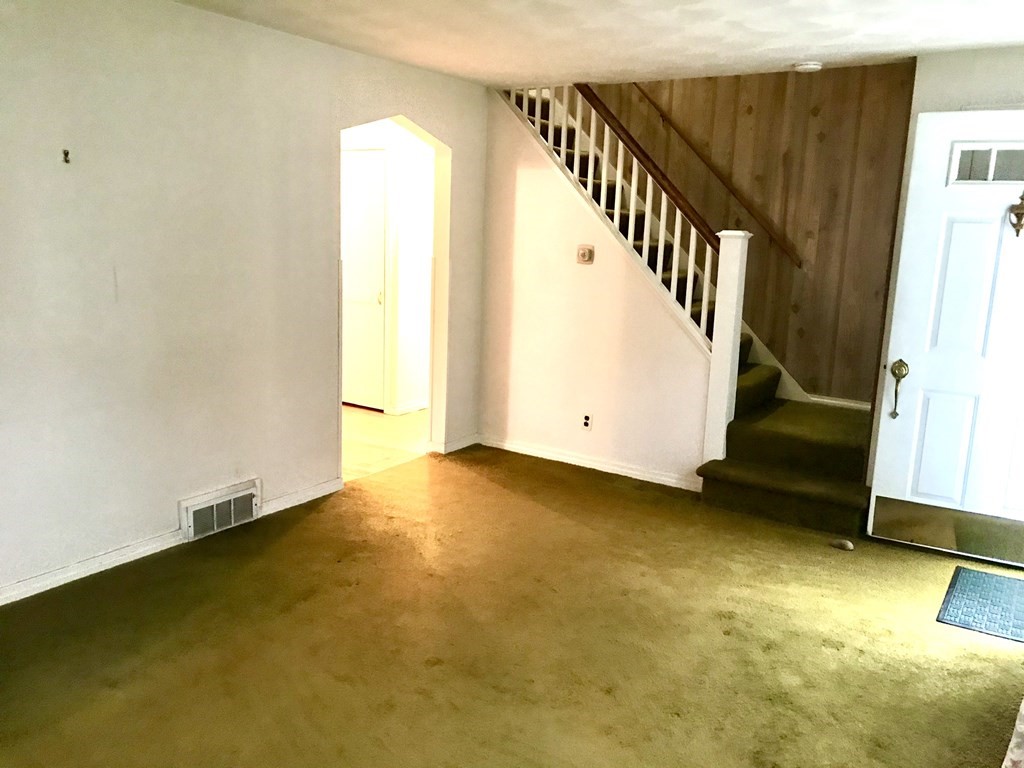 66 Burnside Terrace Springfield, MA 01118 - Photo 18 of 29 a view of an empty room with stairs