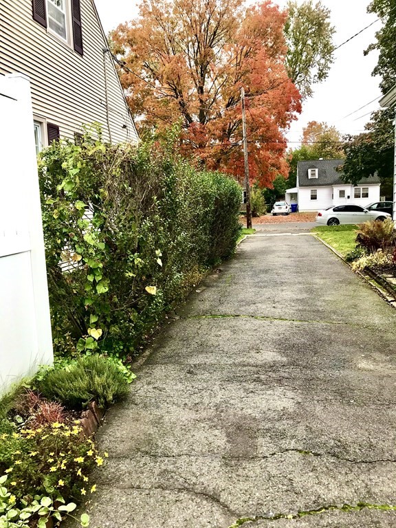 66 Burnside Terrace Springfield, MA 01118 - Photo 4 of 29 a view of street with parked cars