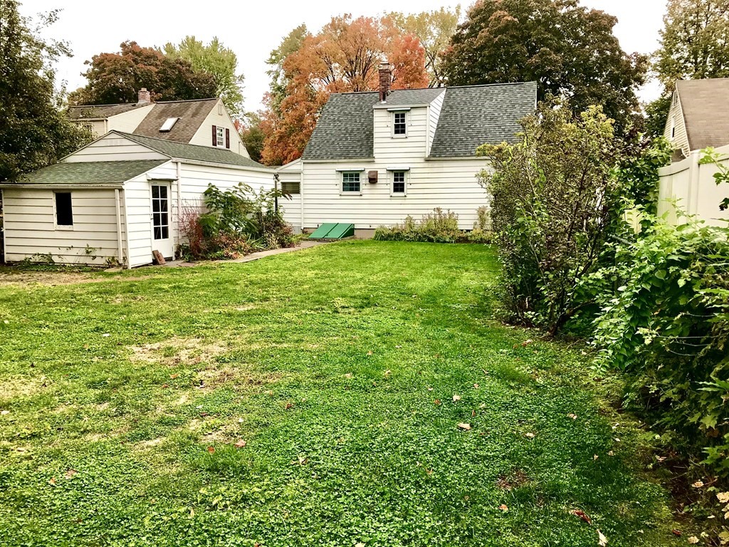 66 Burnside Terrace Springfield, MA 01118 - Photo 6 of 29 a view of a house with a back yard