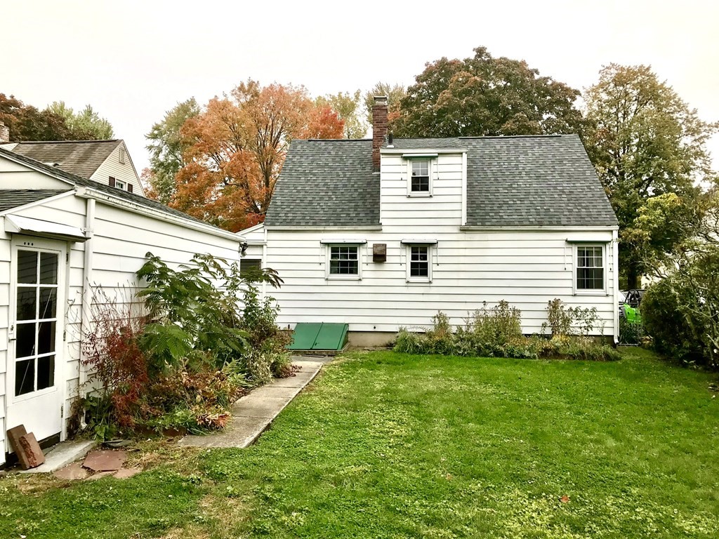 66 Burnside Terrace Springfield, MA 01118 - Photo 7 of 29 a view of a house with a yard