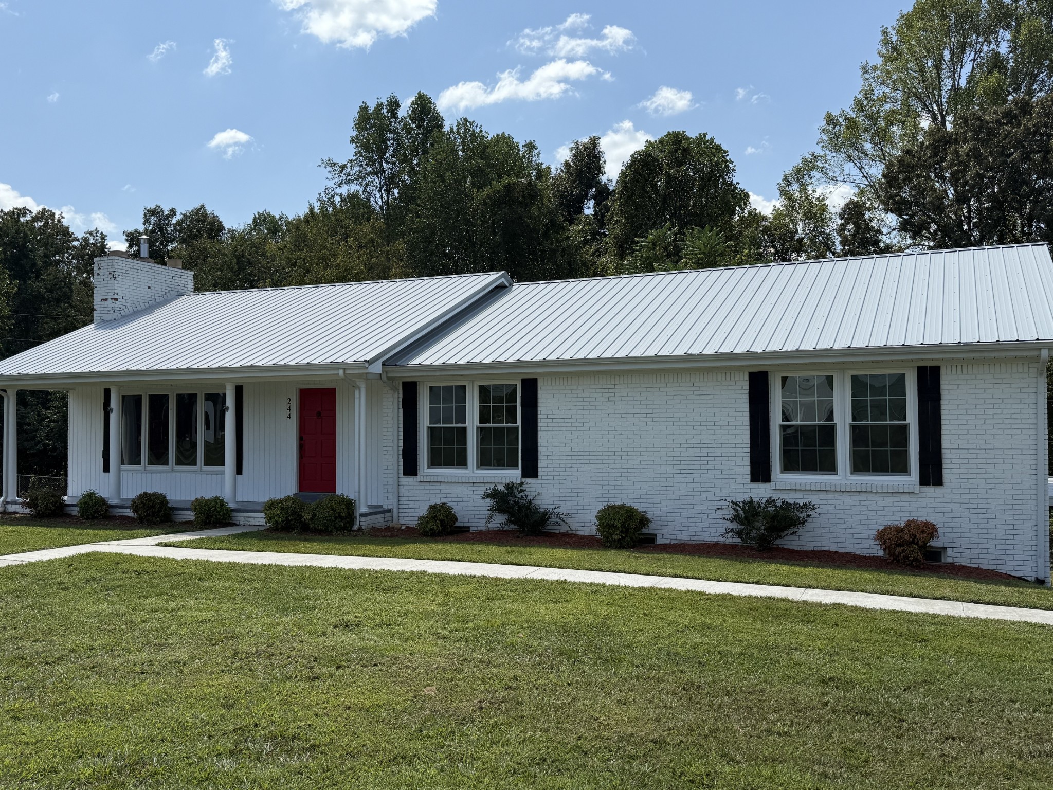 244 James Stafford Road Gainesboro, TN 38562 - Photo 27 of 40 a front view of a house with garden