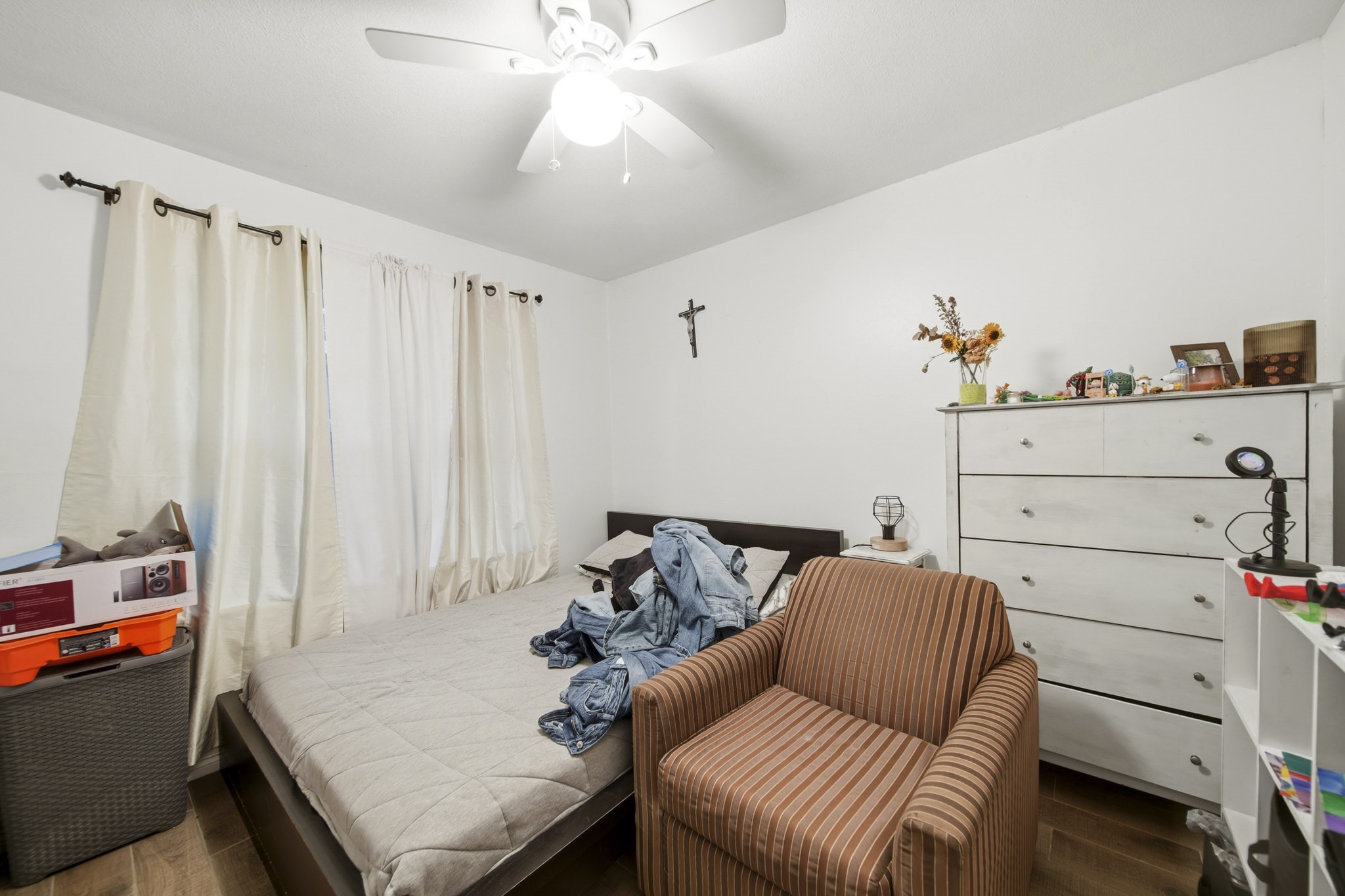731 Meneley Road Winnie, TX 77665 - Photo 19 of 27 a bed room with a bed and a couch