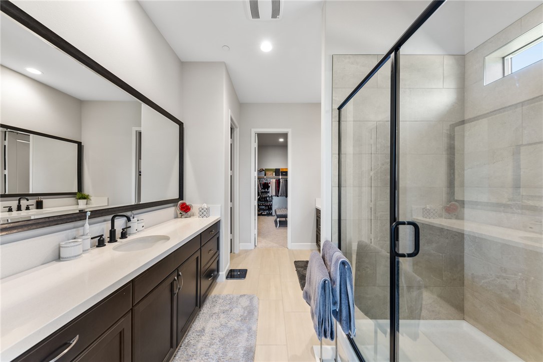 7631 Capstone Court Riverside, CA 92506 - Photo 15 of 39 Primary bathroom with designer walk-in shower
