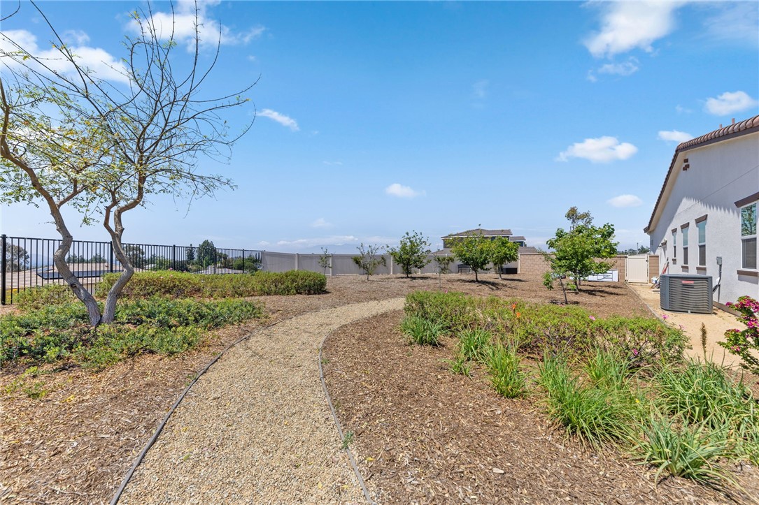 7631 Capstone Court Riverside, CA 92506 - Photo 33 of 39 Vinyl and wrought iron fencing