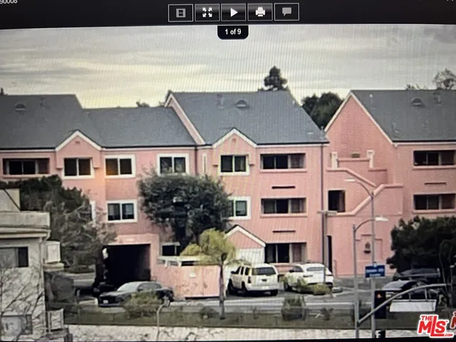 a front view of residential houses with street