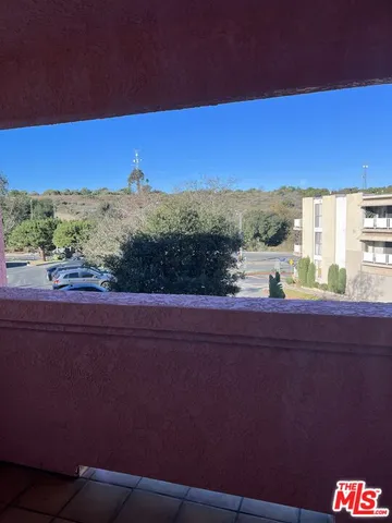 a view of a city from a balcony