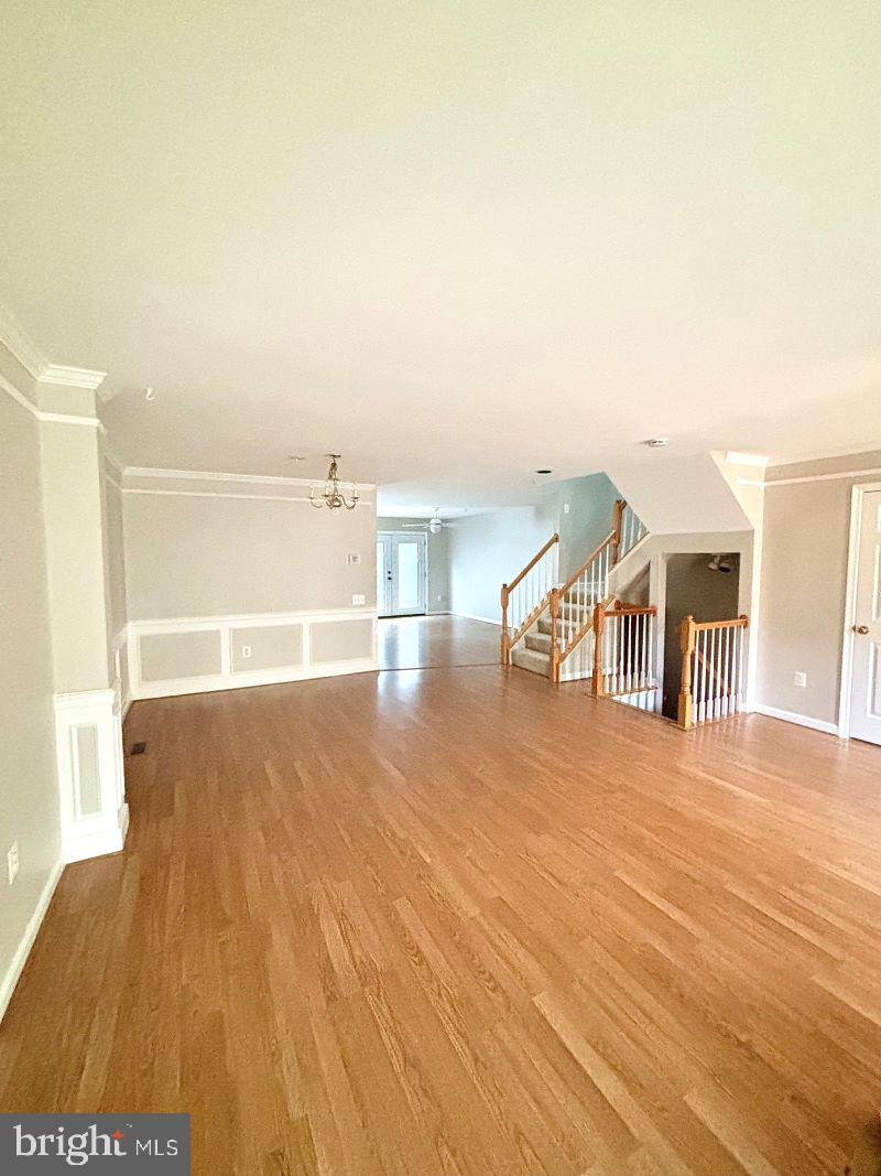 12411 Carters Grove Place Silver Spring, MD 20904 - Photo 2 of 11 a view of a room with wooden floor