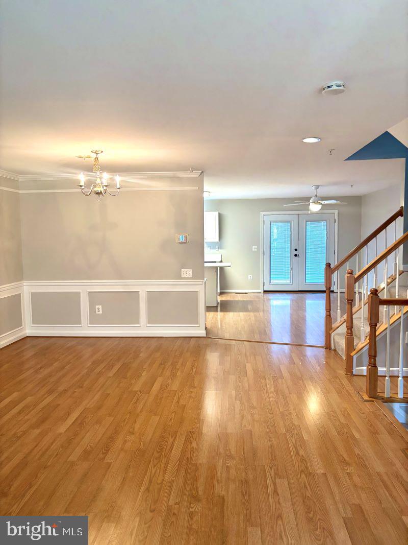12411 Carters Grove Place Silver Spring, MD 20904 - Photo 3 of 11 a view of a living room with wooden floor