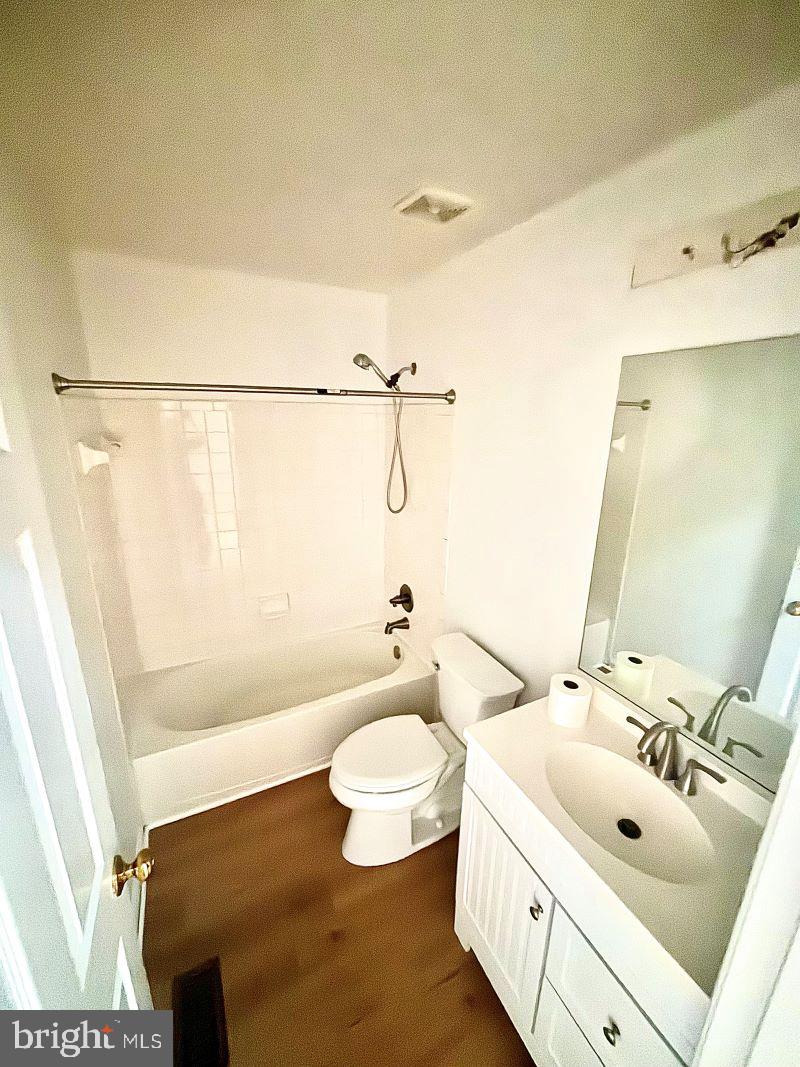 12411 Carters Grove Place Silver Spring, MD 20904 - Photo 10 of 11 a bathroom with a sink a toilet and shower