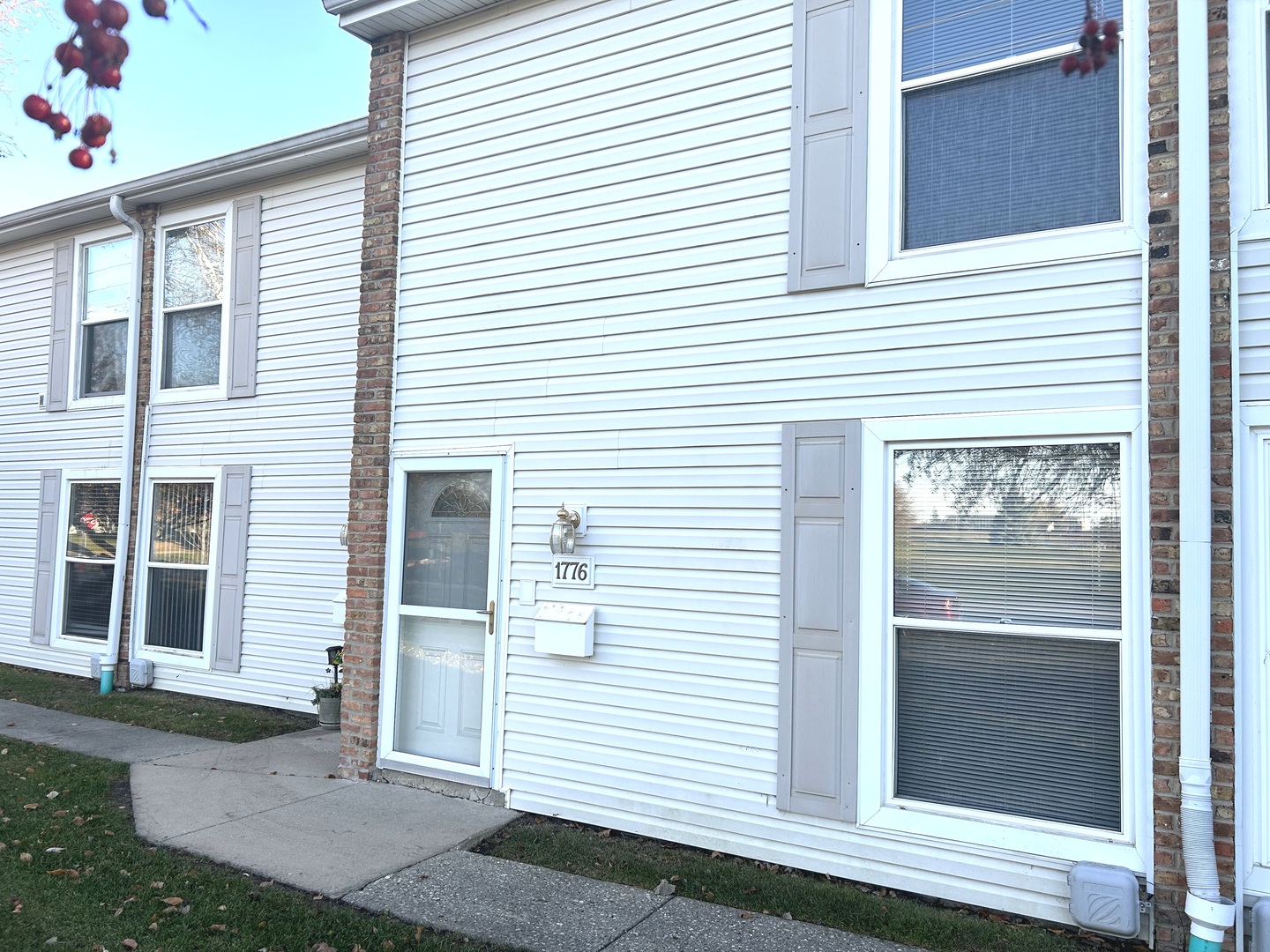 a view of front door and a window