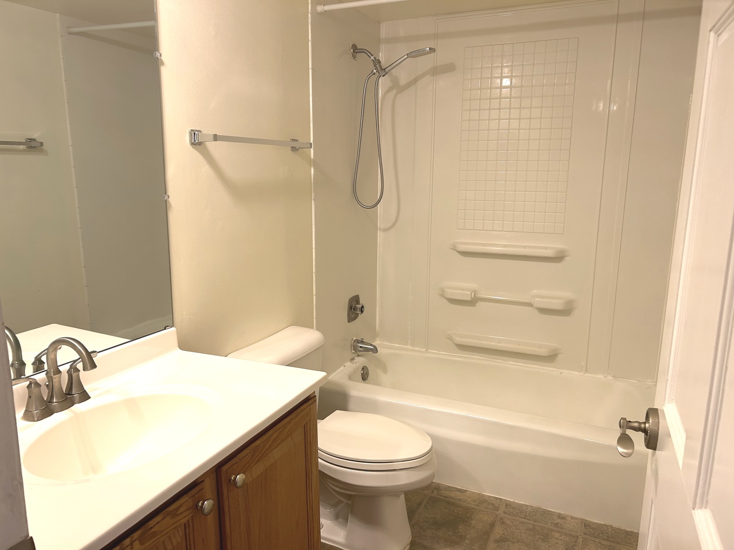 1776 Hassell Road Hoffman Estates, IL 60169 - Photo 16 of 23 a bathroom with a sink toilet and shower