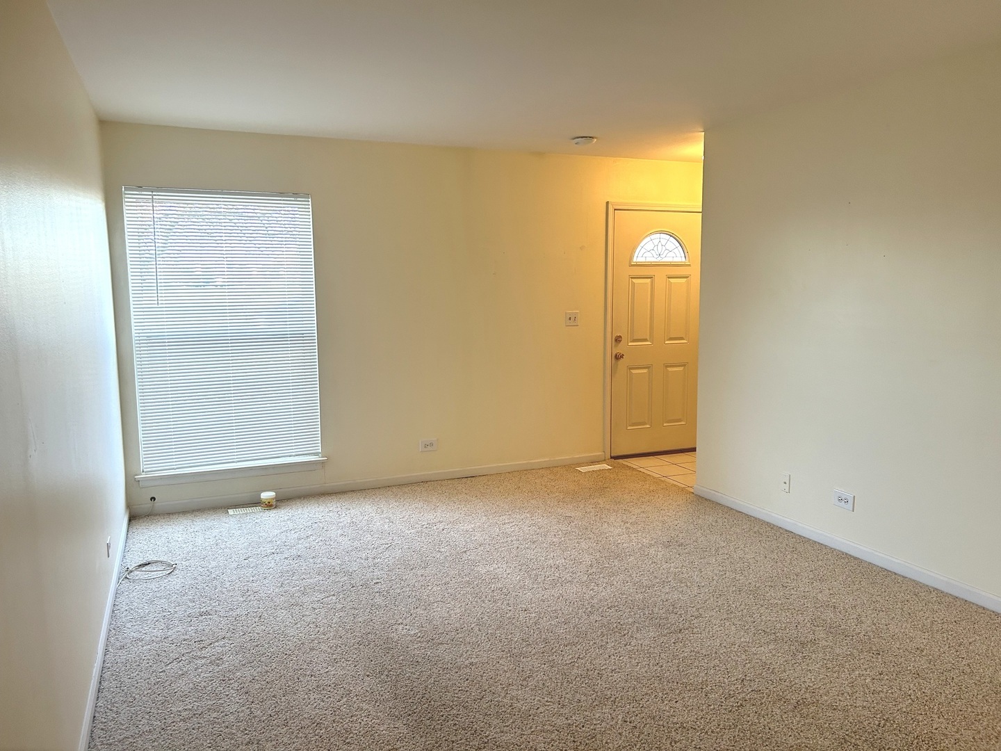 1776 Hassell Road Hoffman Estates, IL 60169 - Photo 8 of 23 an empty room with windows