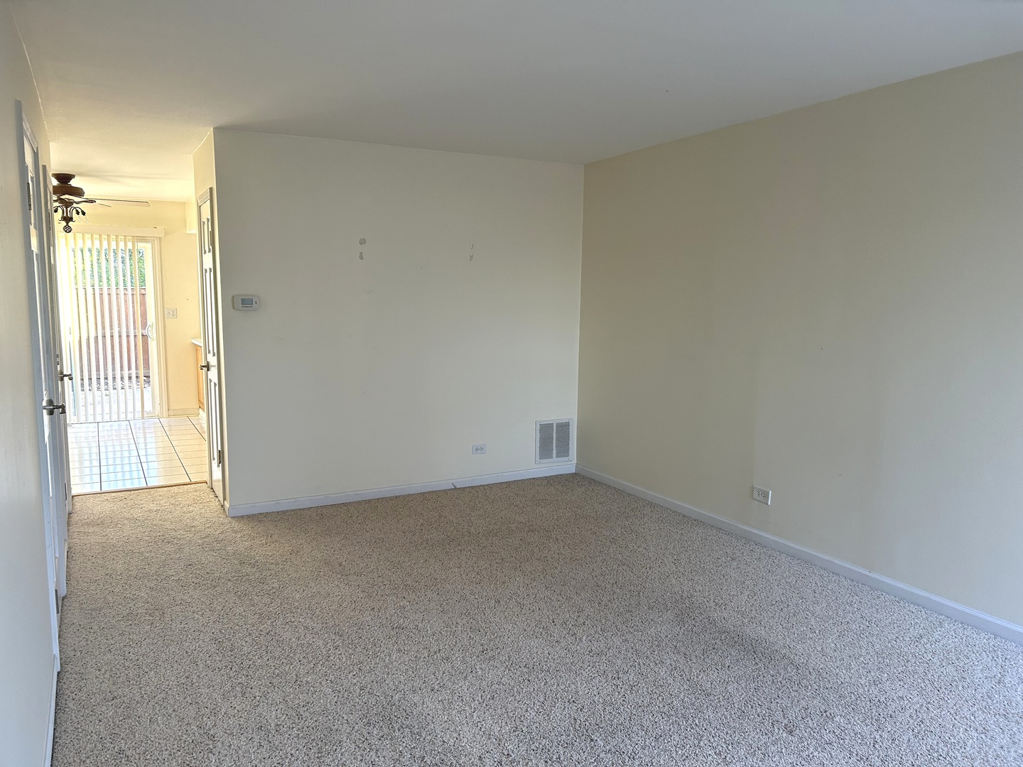 1776 Hassell Road Hoffman Estates, IL 60169 - Photo 9 of 23 a view of an empty room and a window