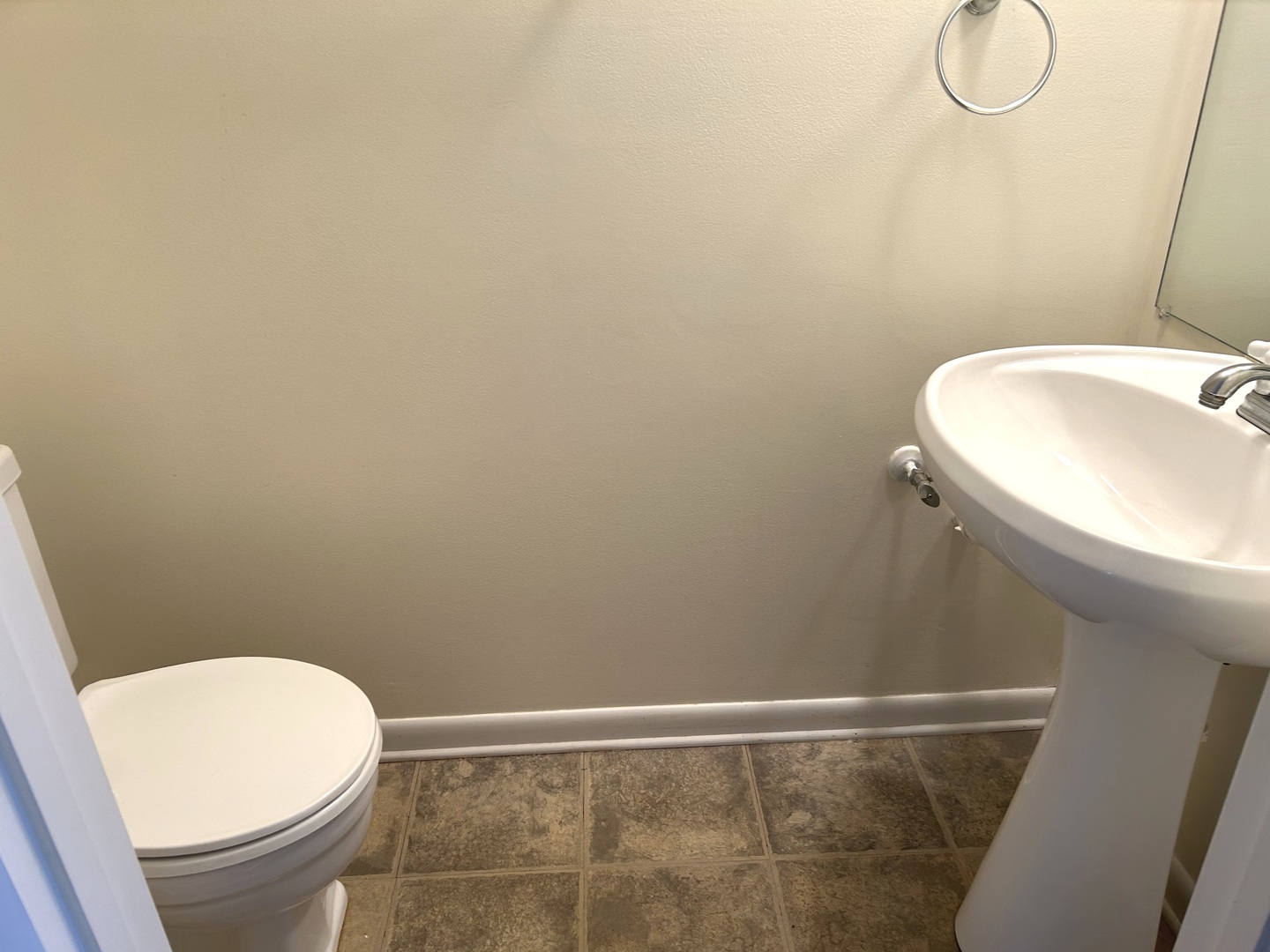 1776 Hassell Road Hoffman Estates, IL 60169 - Photo 10 of 23 a bathroom with a toilet and a sink