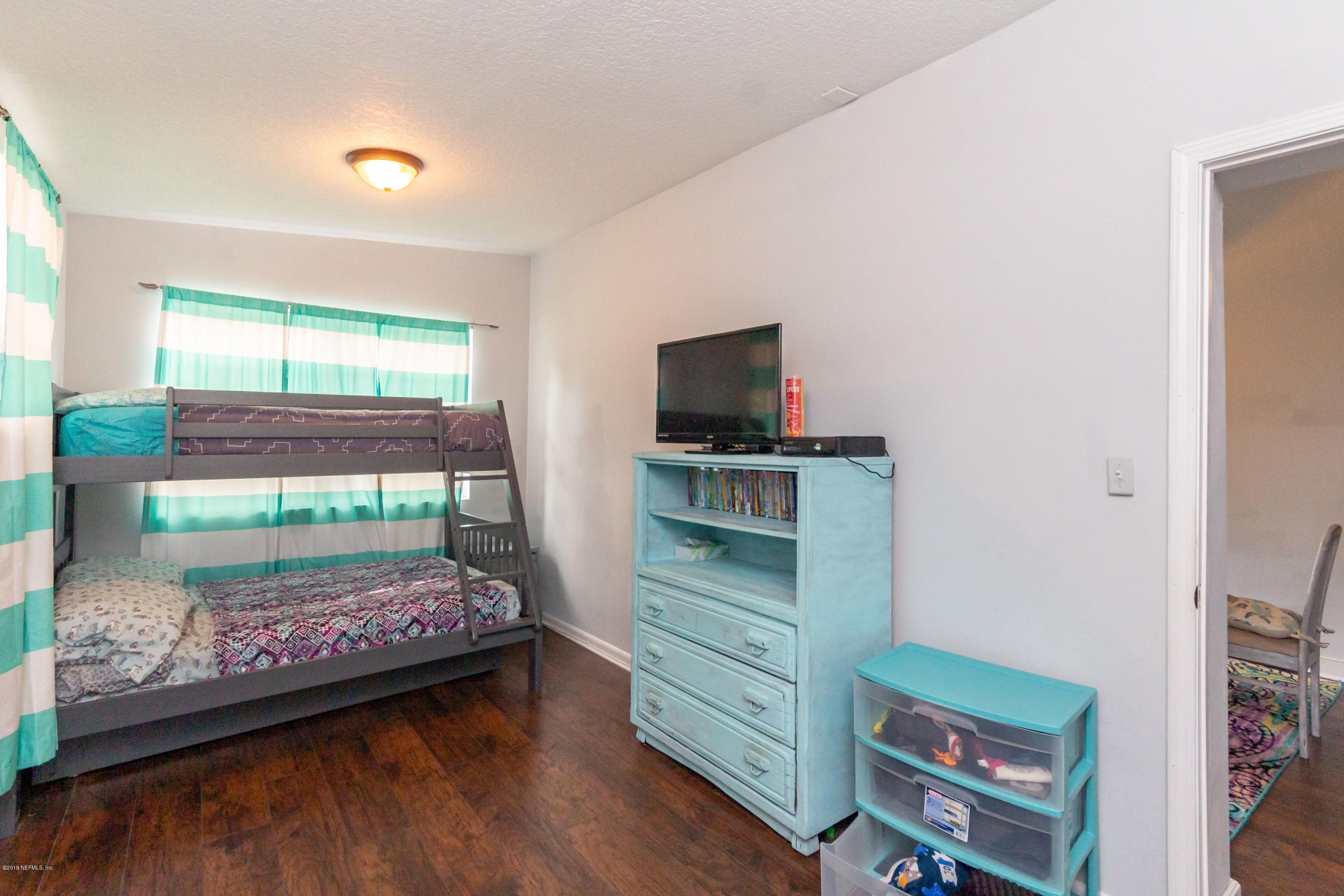 3227 Rogero Road Jacksonville, FL 32277 - Photo 16 of 27 Second Bedroom View 2