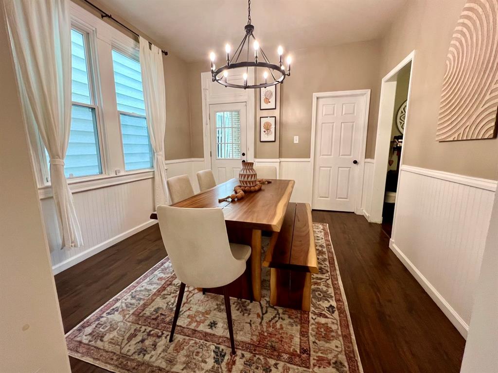 237 Lelia Street Pittsburgh, PA 15211 - Photo 15 of 46 a view of a dining room with furniture window and wooden floor