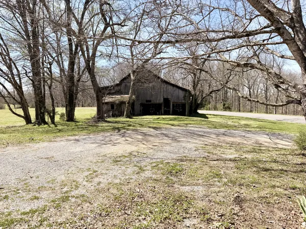 a house with trees in front of it