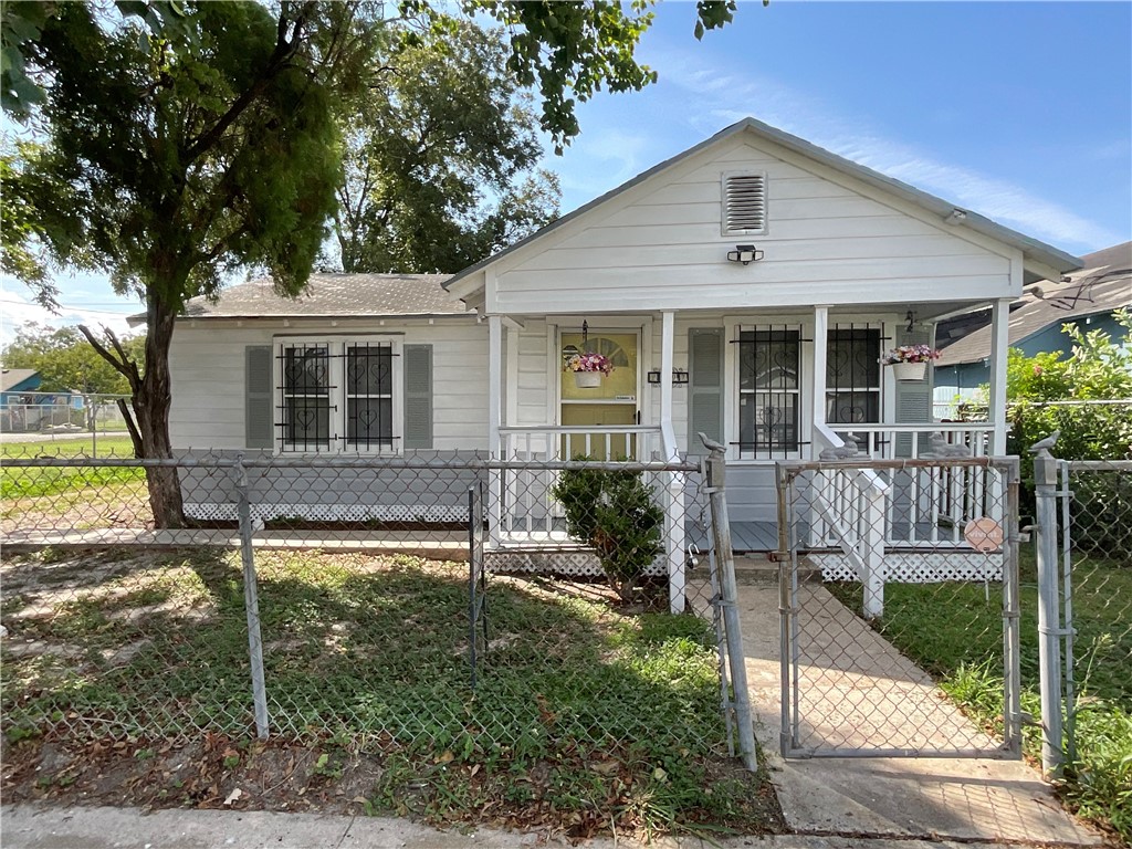 2507 Morris Street Corpus Christi, TX 78405 - Photo 1 of 16 front view of a house with a yard