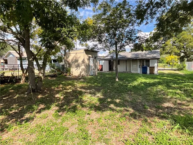 a house view with a garden space